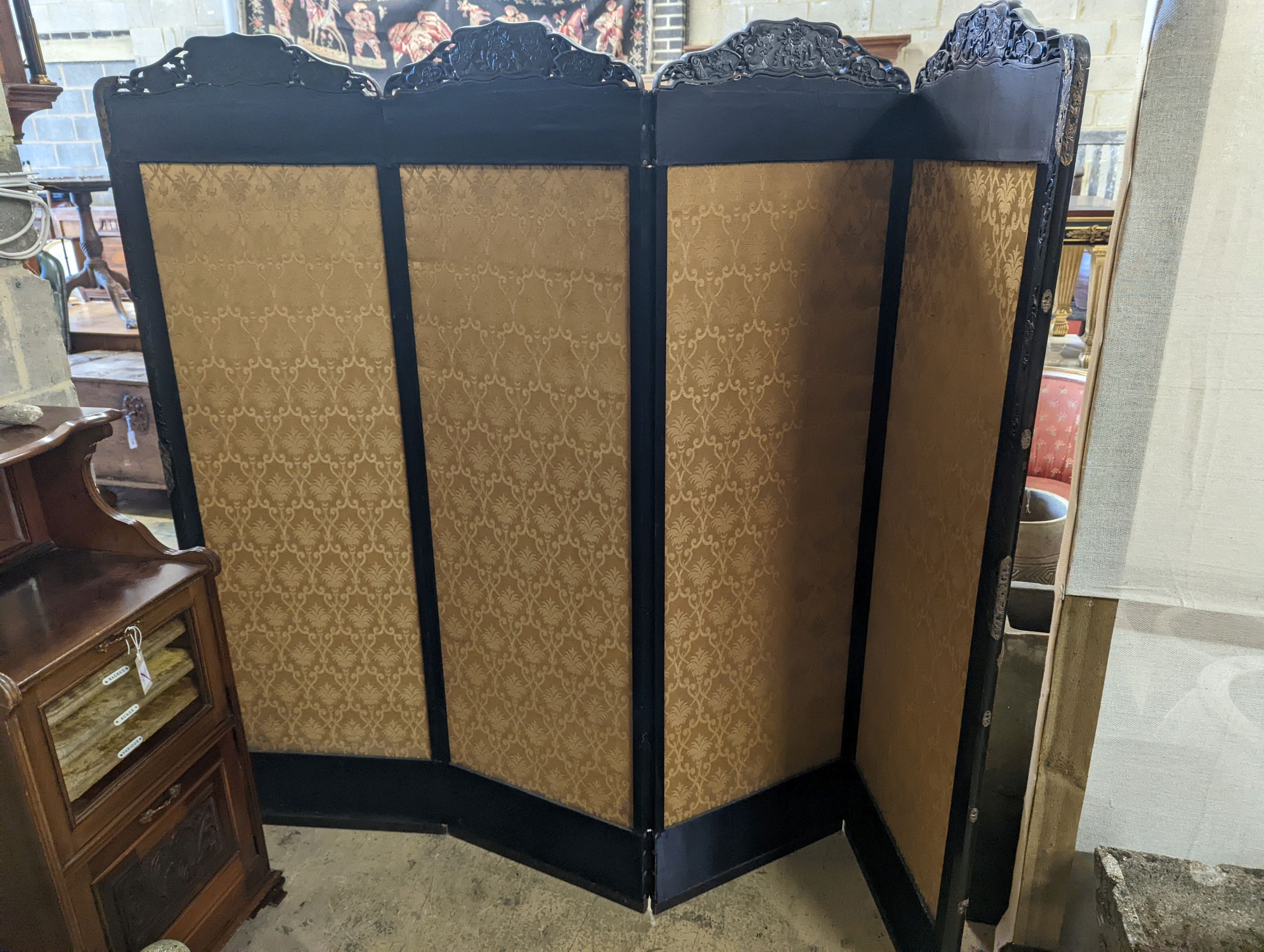 A Chinese hardwood four fold dressing screen, each panel width 56cm, height 176cm